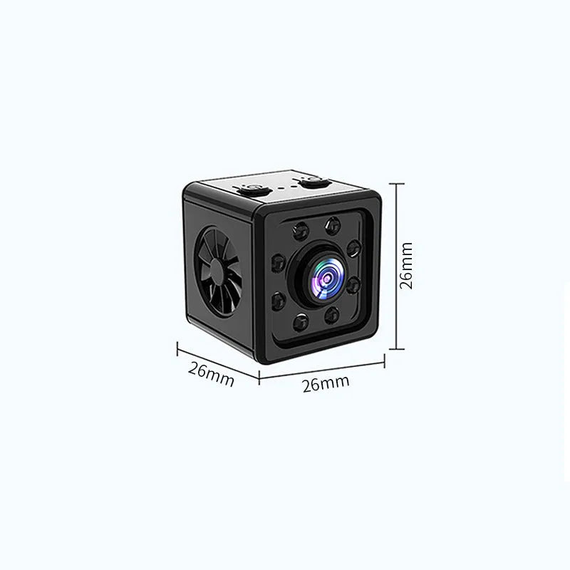Black cubic Remote Network K13 Sports Camera on a table with its mounting bracket and data cable.