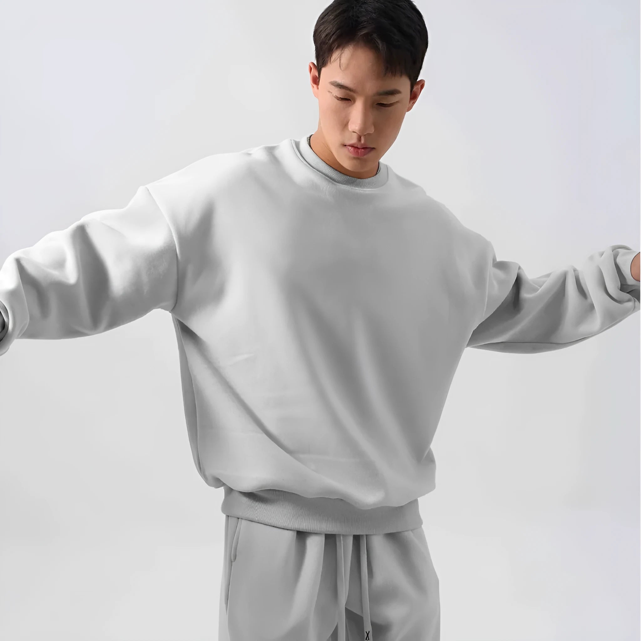Men's polar fleece winter sports suit set showing crew neck coat and padded trousers in double-sided fleece fabric