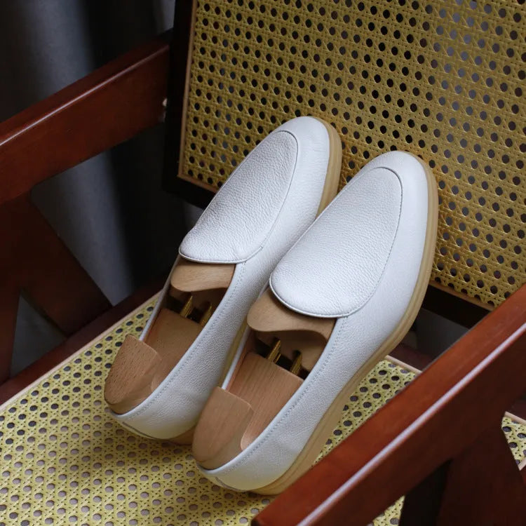 Men's genuine leather loafers in brown with a TPR sole and low tube sock design.