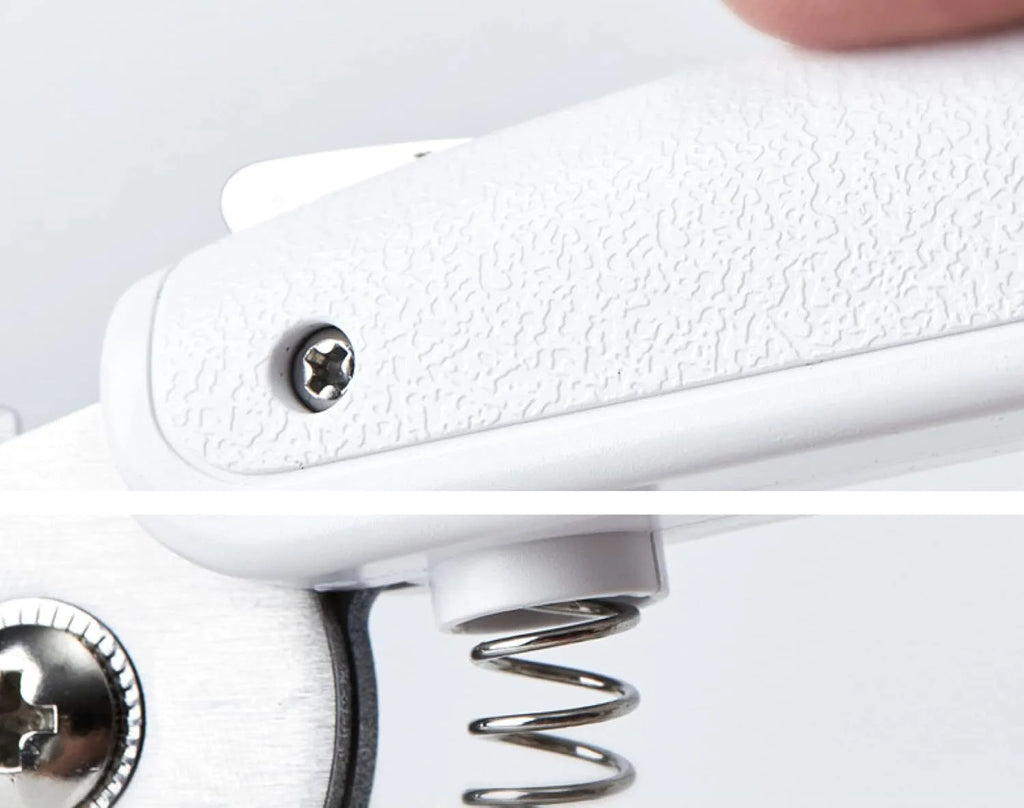 White pet nail clippers with built-in LED light and transparent anti-splash guard.