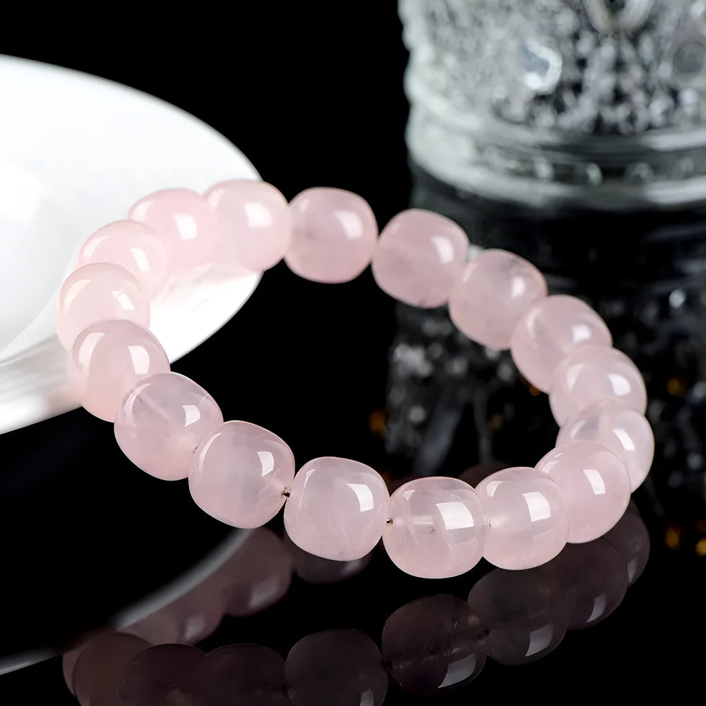 Pink crystal and bamboo bracelet with 11-12mm barrel beads and geometric design