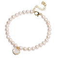 Women's freshwater pearl bracelet with a gold-toned fan charm on a 16cm elastic string.