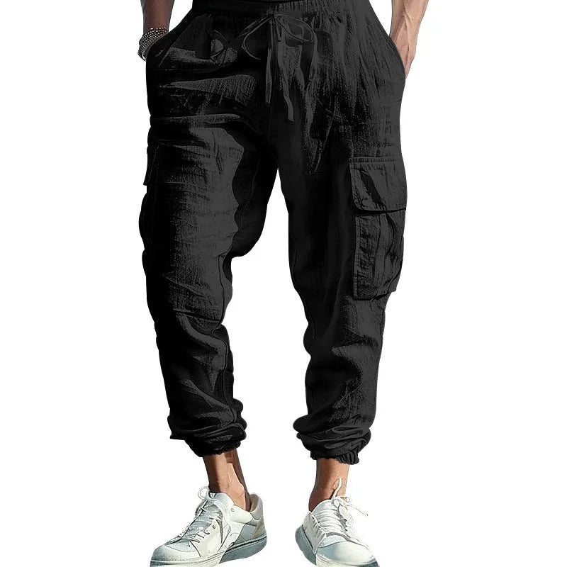 Men's linen casual trousers with elastic drawstring waist and ankle-tied cuffs in solid colours
