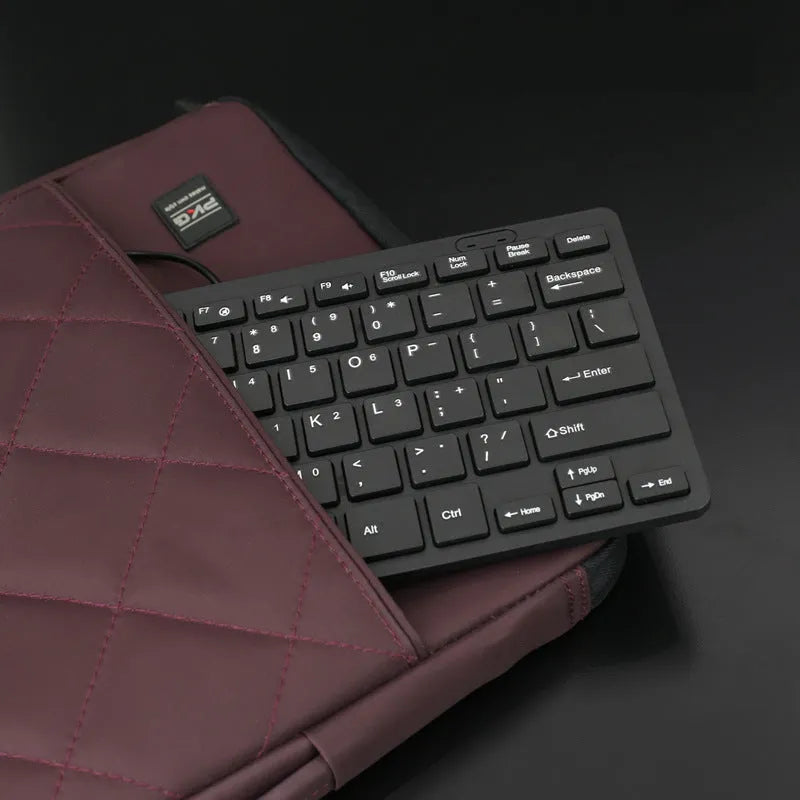 Compact wired USB mini keyboard in black with noiseless keys and 1.3 metre cable