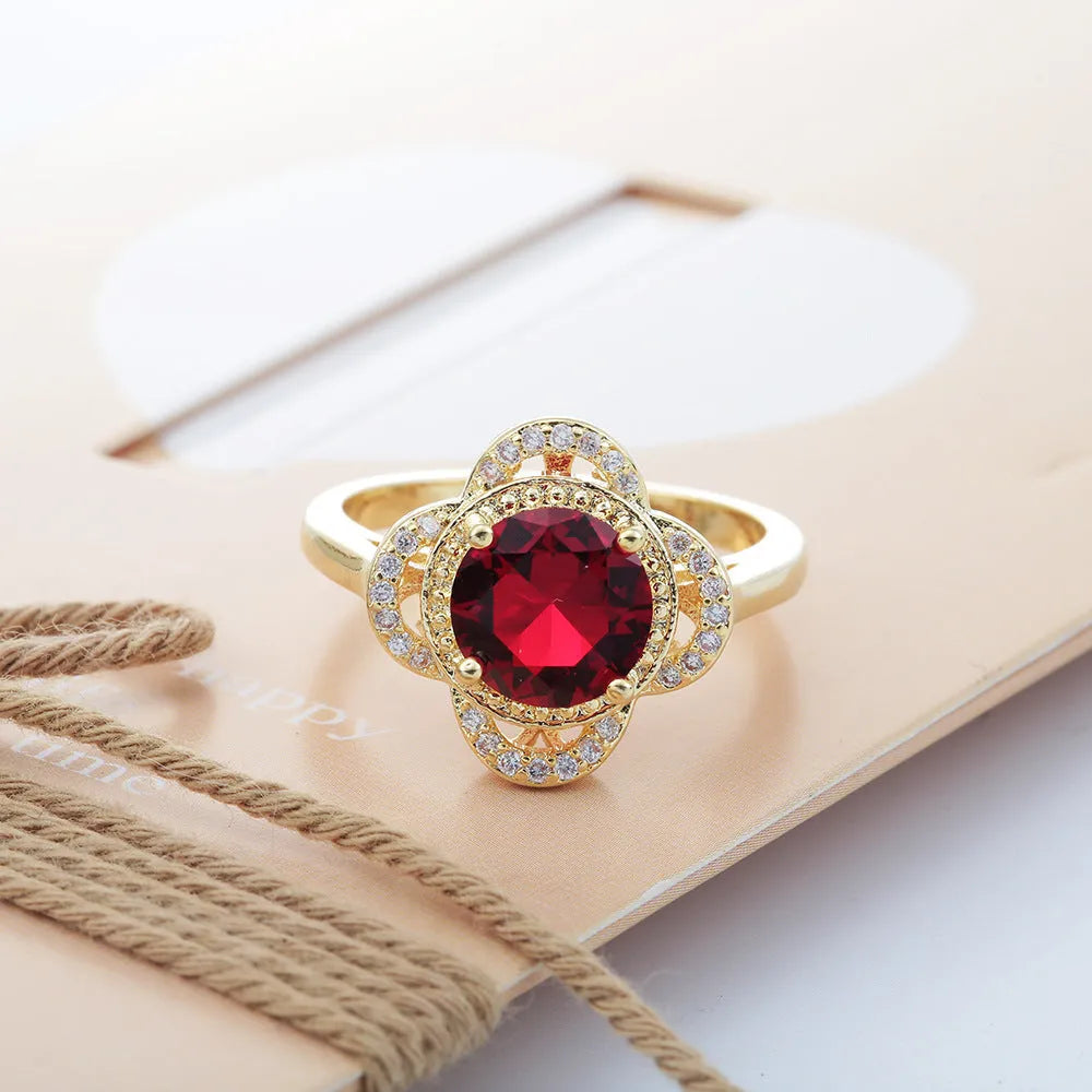 Copper ring with fruit-shaped zircon design in electroplated finish showing sizes 7, 8, 9 options