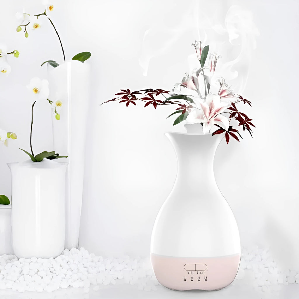 White or pink ultrasonic aroma diffuser vase with colourful LED night light and water tank.