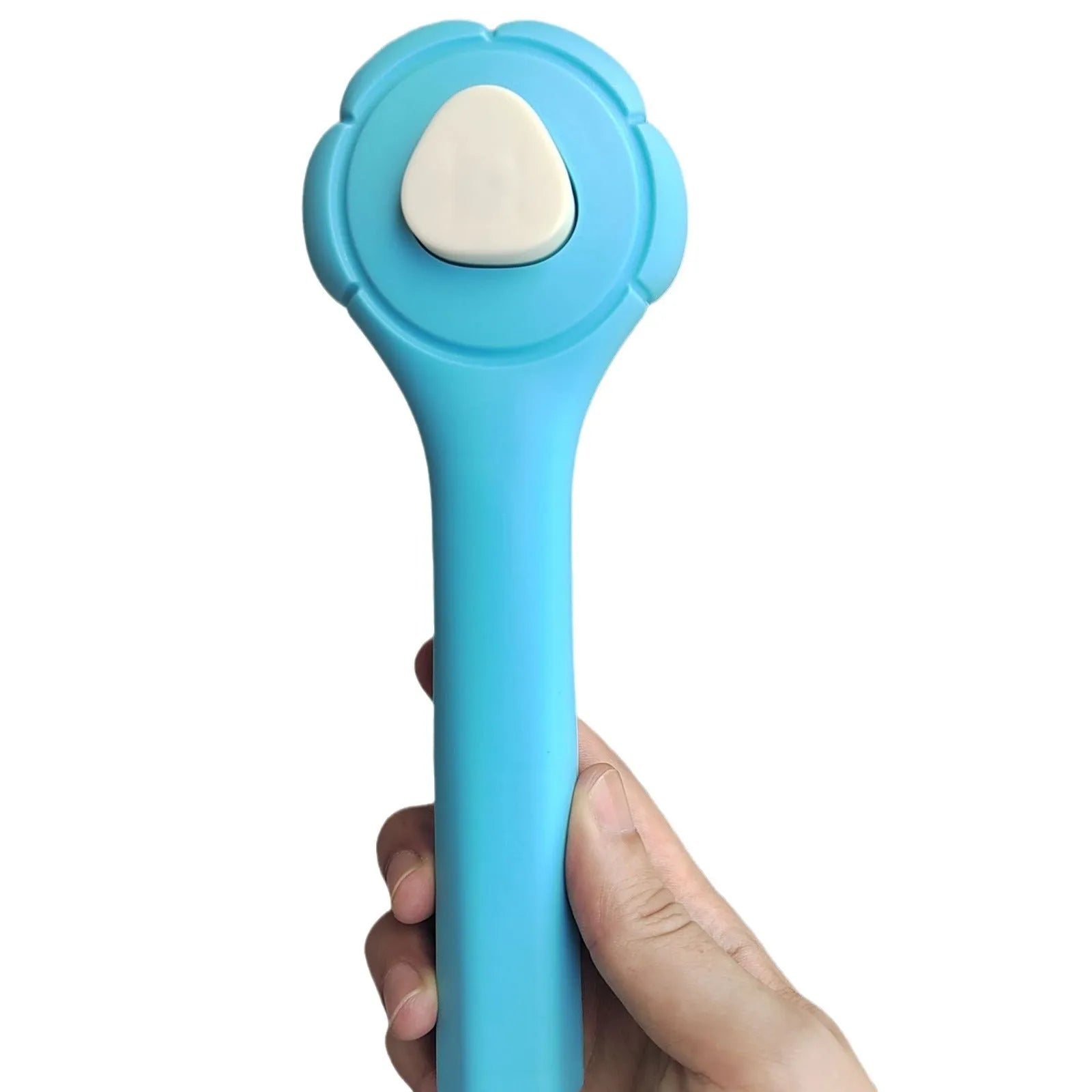 Floating needle comb for cats and dogs in green colour with ABS handle and steel teeth
