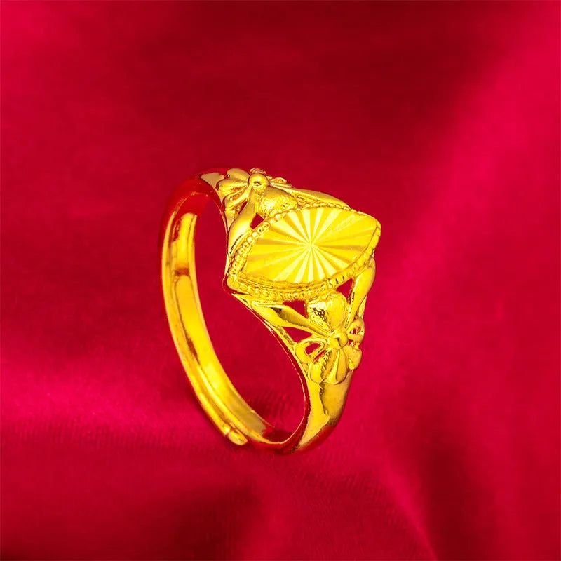 Gold electroplated open diamond flower ring with geometric design and textured surface