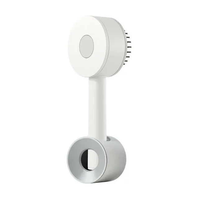 Plastic air cushion comb with long handle in white, green, and pink colours for hair detangling and styling