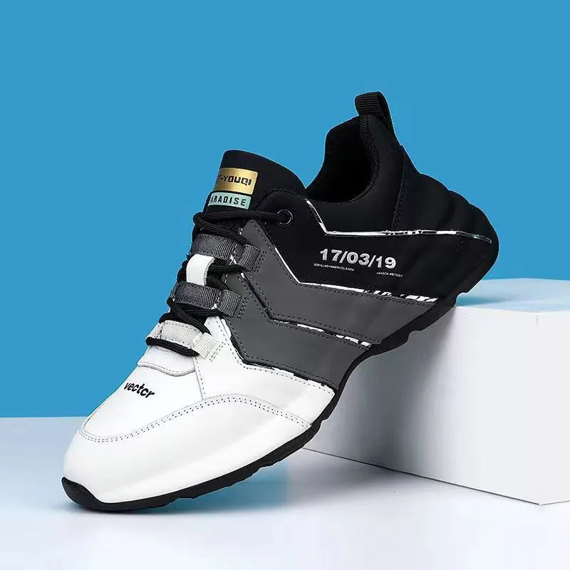Low-top casual sneaker for teenagers in a grey colour with mesh lining and a plastic sole, shown with lace-up fastening.