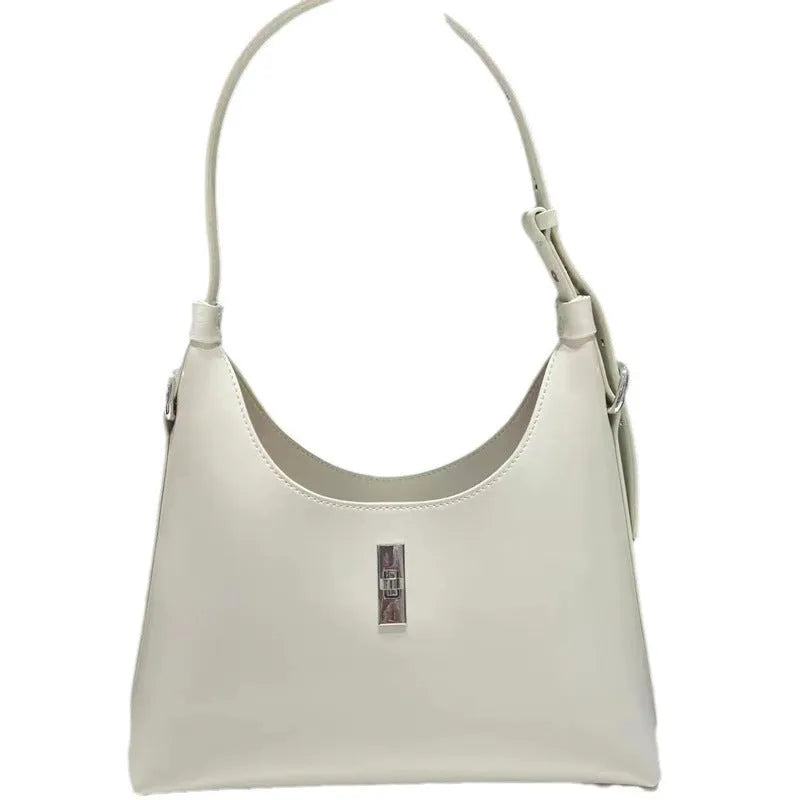 Soft genuine leather crossbody shoulder bag in a dumpling shape, shown in one of six available colours.