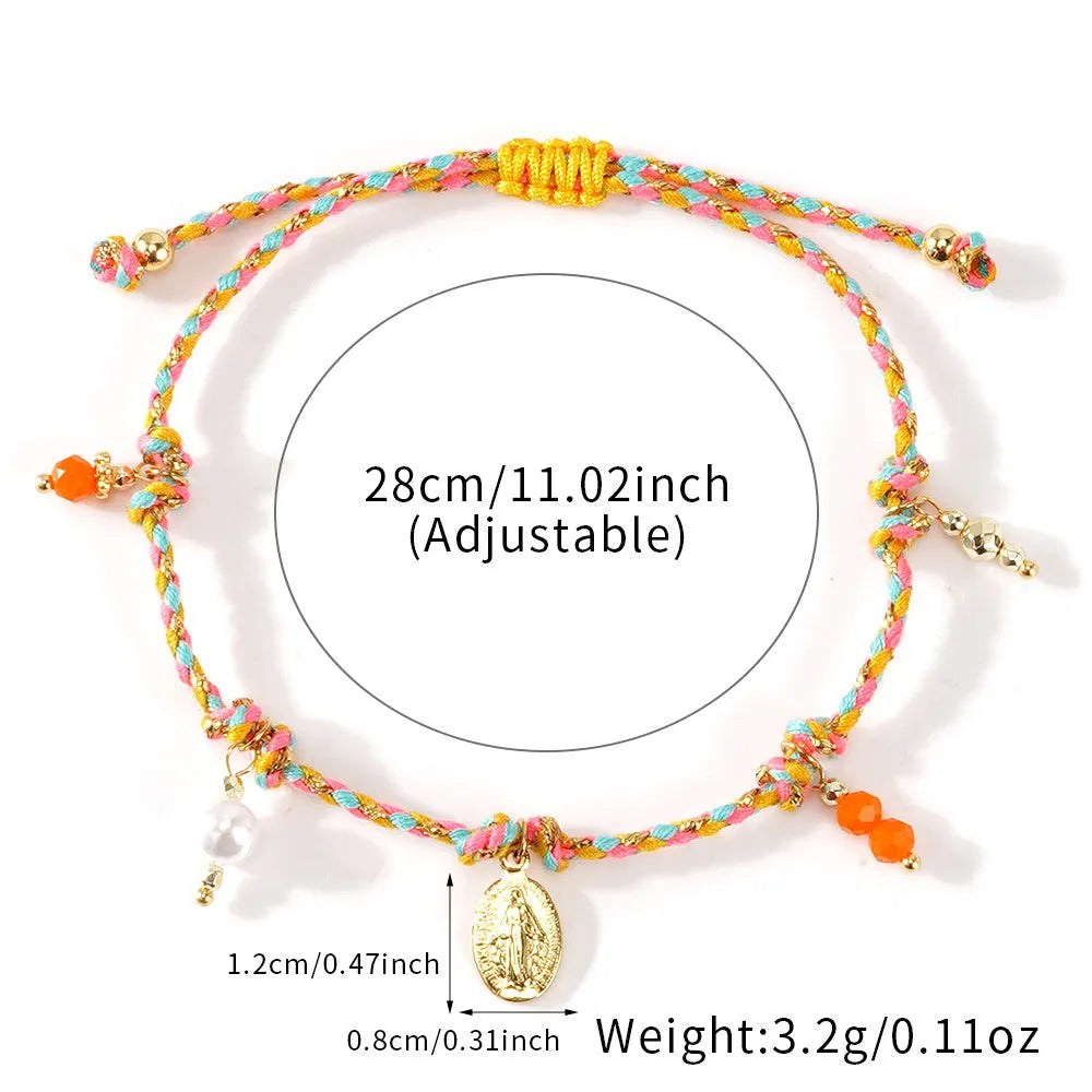 Close-up of a hand-woven ethnic bracelet for women made from colourful braided rope.