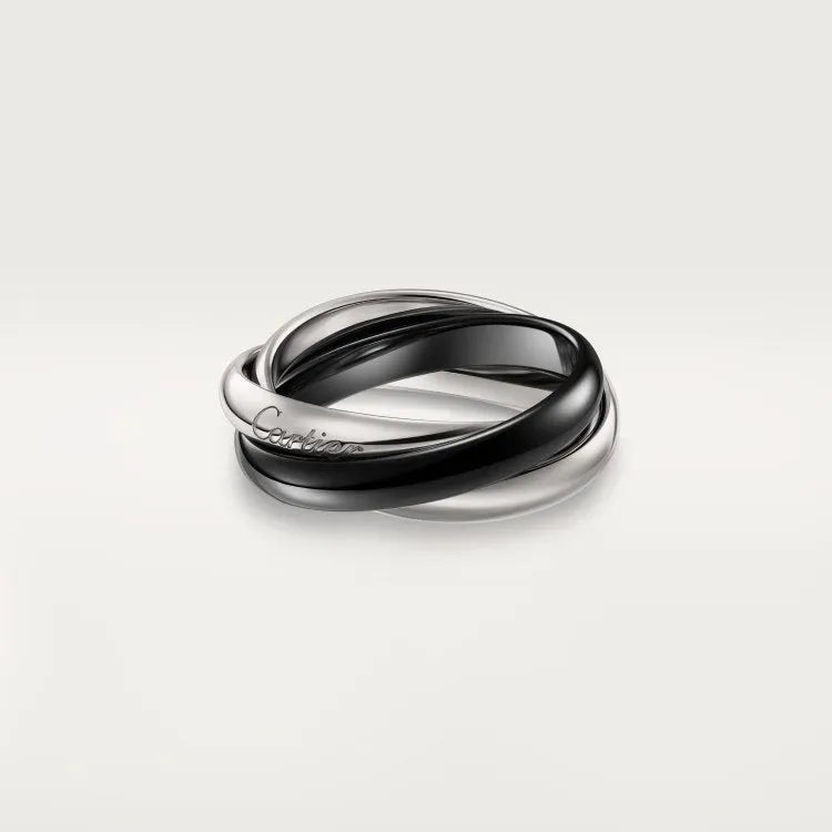 A geometric U-shaped silver couple ring engraved with text, shown in a gold rose silver finish.