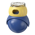 Yellow and blue owl-shaped tumbler puzzle feeder for cats with sliding ball treat mechanism