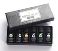 Six 10ml essential oil bottles in a row – tea tree, mint, sweet orange, eucalyptus, rosemary, lavender