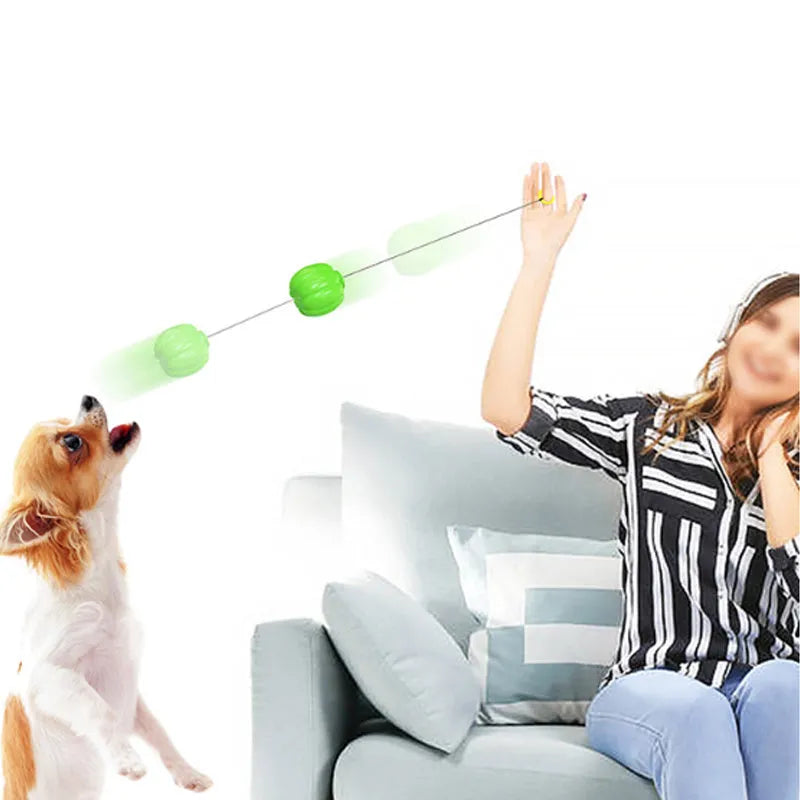 Green, orange, and yellow Halloween pumpkin-shaped dog ball toy with squeaker for small dogs.