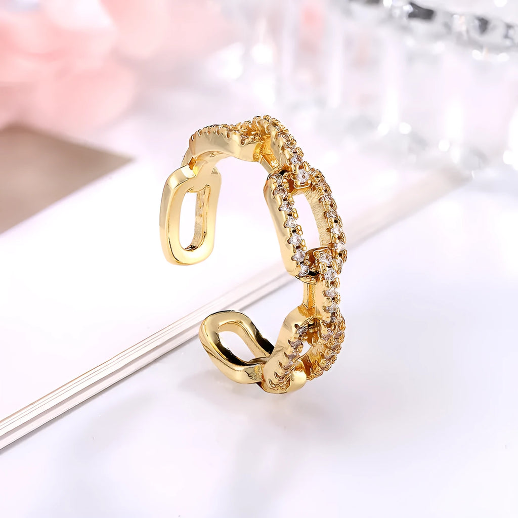 Gold ladies' ring with chain-style design encrusted with micro-inlaid CZ zircon stones, adjustable opening, copper base