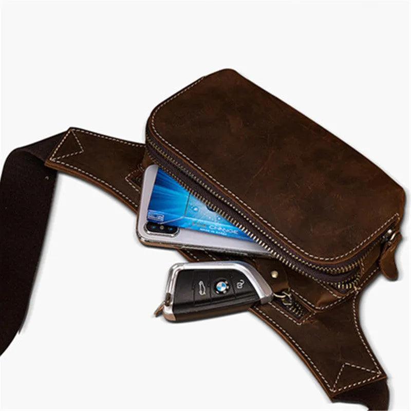 Brown cowhide leather men's sports waist bag with zip, shown with phone in internal pocket.