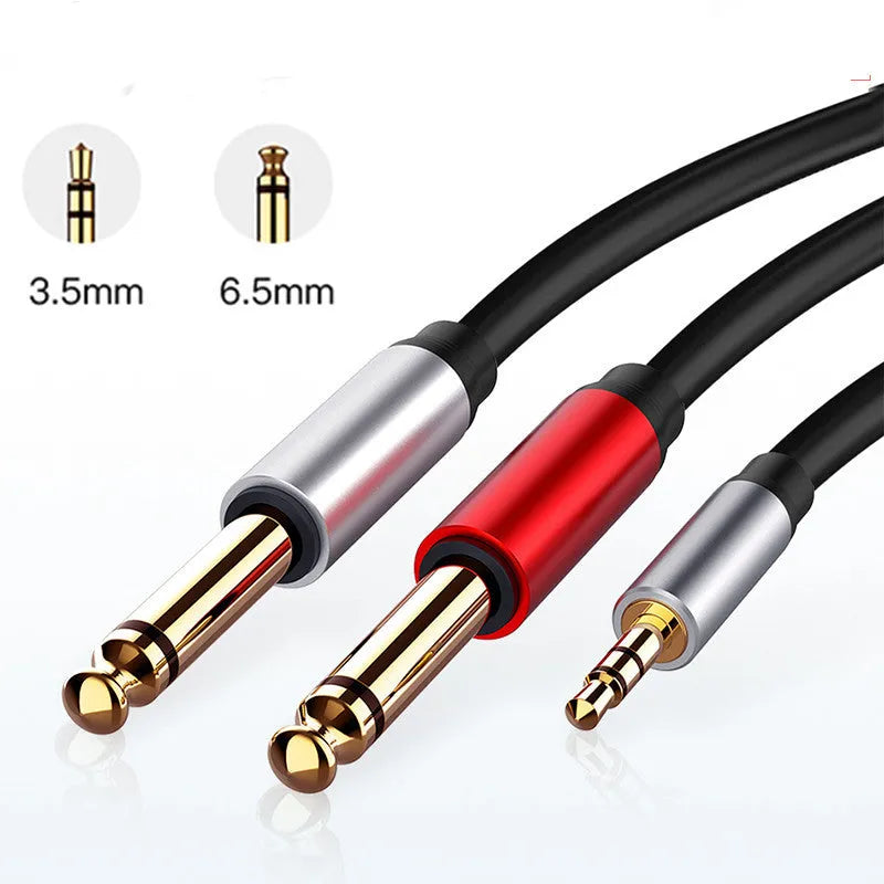 3.5mm stereo to two 6.5mm male audio cable with gold-plated connectors on a black background