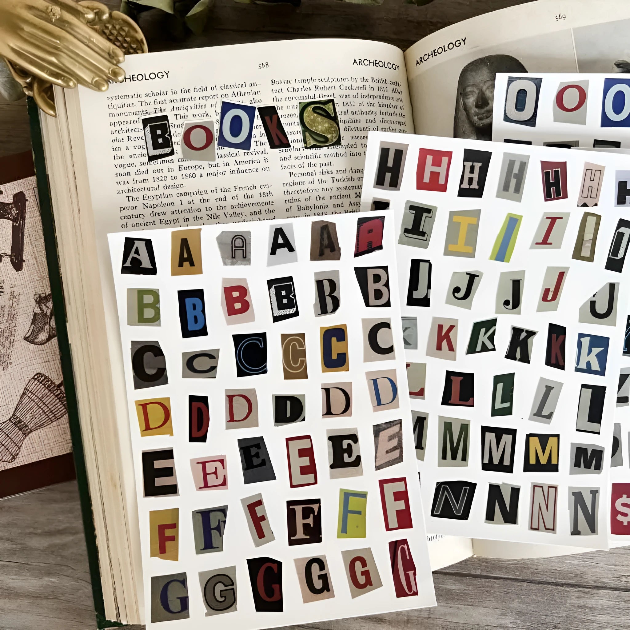 A set of cute-style decoration stickers showing printed English letters and weekly words like Monday, Tuesday.