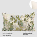 Antique green square pillow with abstract spring flowers pattern on a grey sofa.