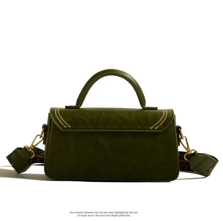 Women's brown retro texture messenger bag showing square vertical shape and sewing thread details