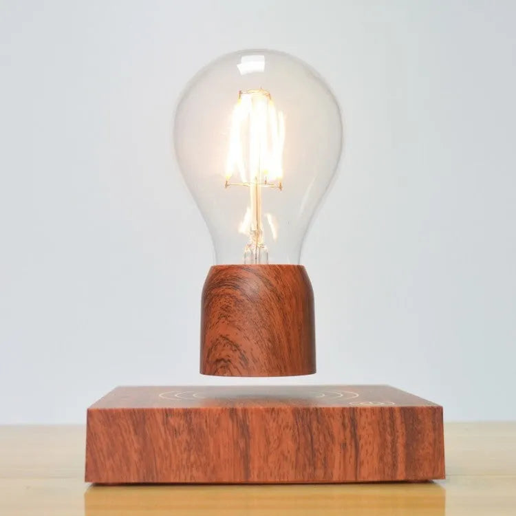 Magnetic levitation floating light bulb on imitation wood base with choice of international plugs.