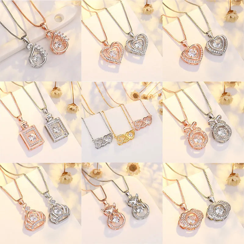 Sterling silver heart pendant necklace with crown and bow detailing in rose gold finish