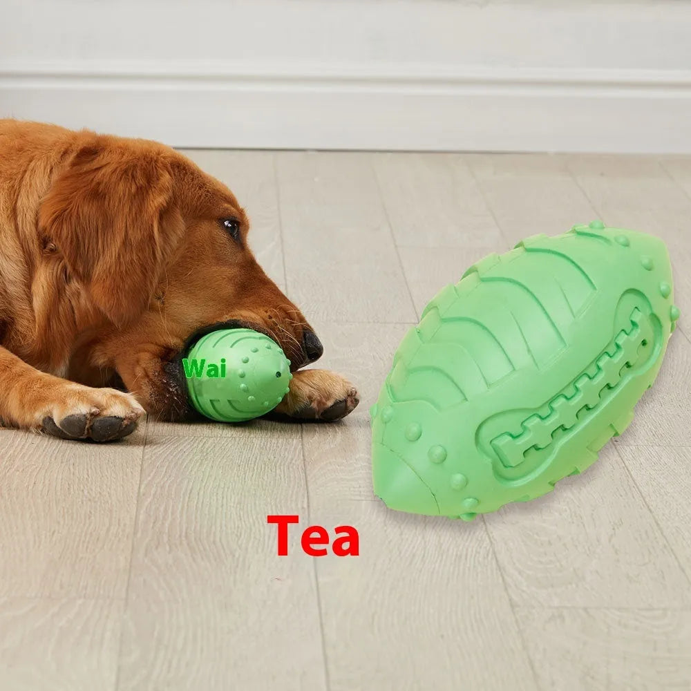 Thickened rubber dog training rugby ball in sapphire blue with vocal squeaker for teeth cleaning