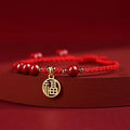 Cinnabar braided rope bracelet with round bead blessing card in wine red colour