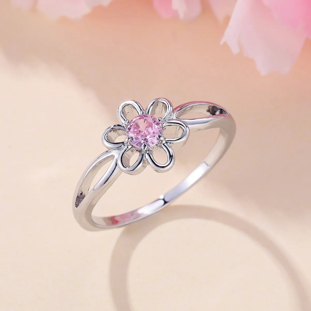 Women's copper ring with hollow floral design in electroplated platinum pink diamond colour