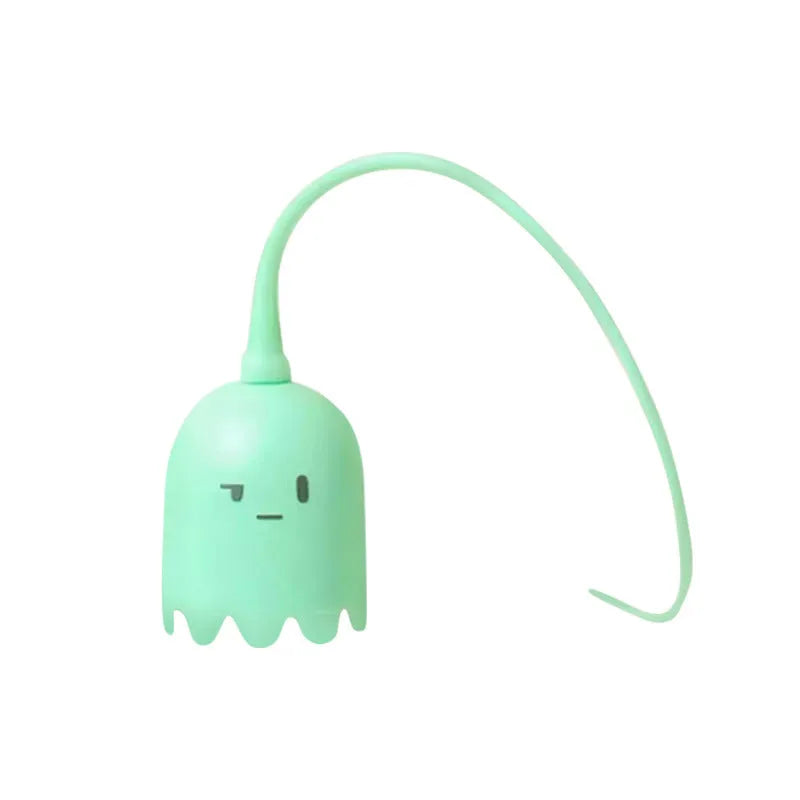 Rechargeable automatic cat toy with motorised swinging silicone tail on green background