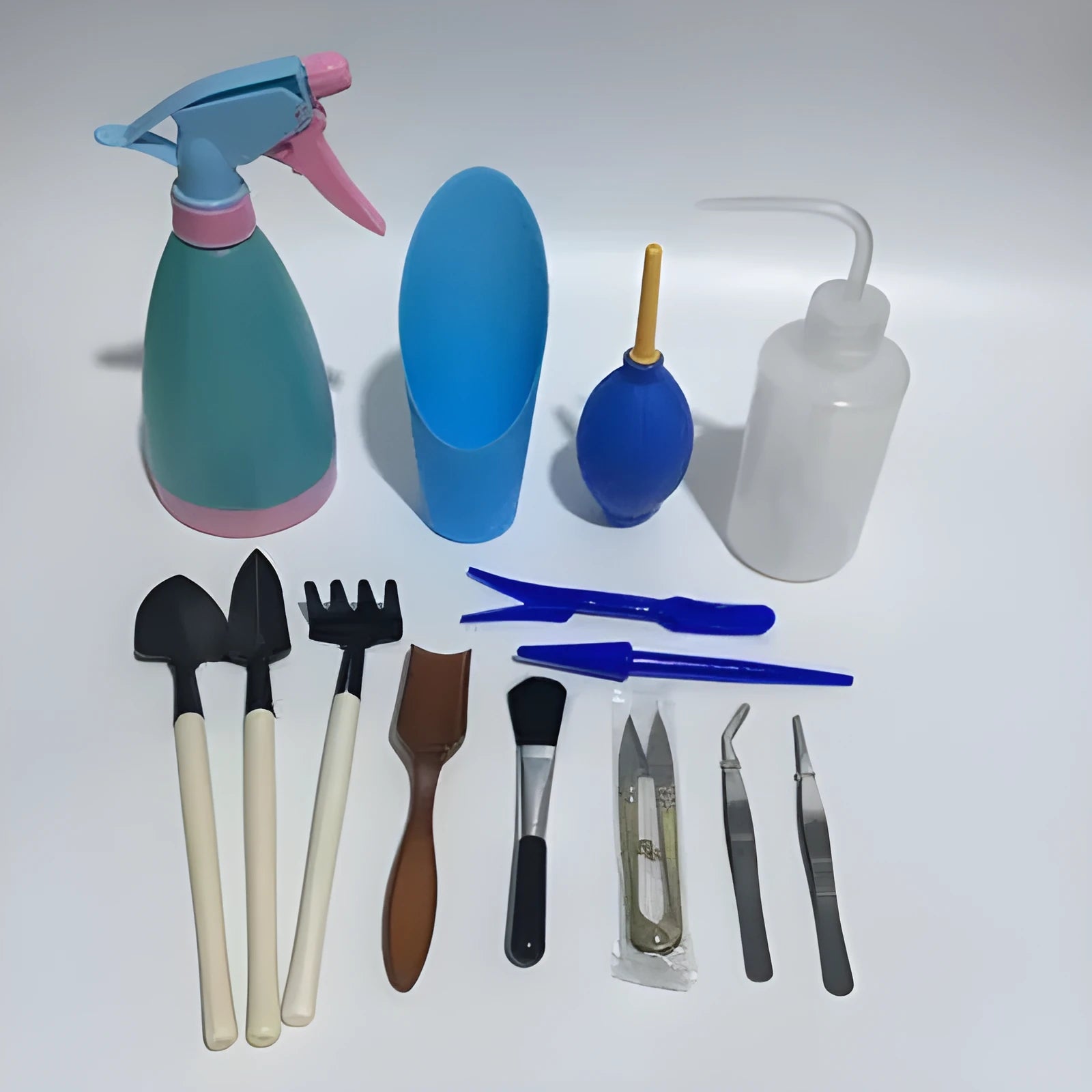 21-piece succulent gardening tool set with drip kettle, tweezers, mini shovels, and transplanting tools