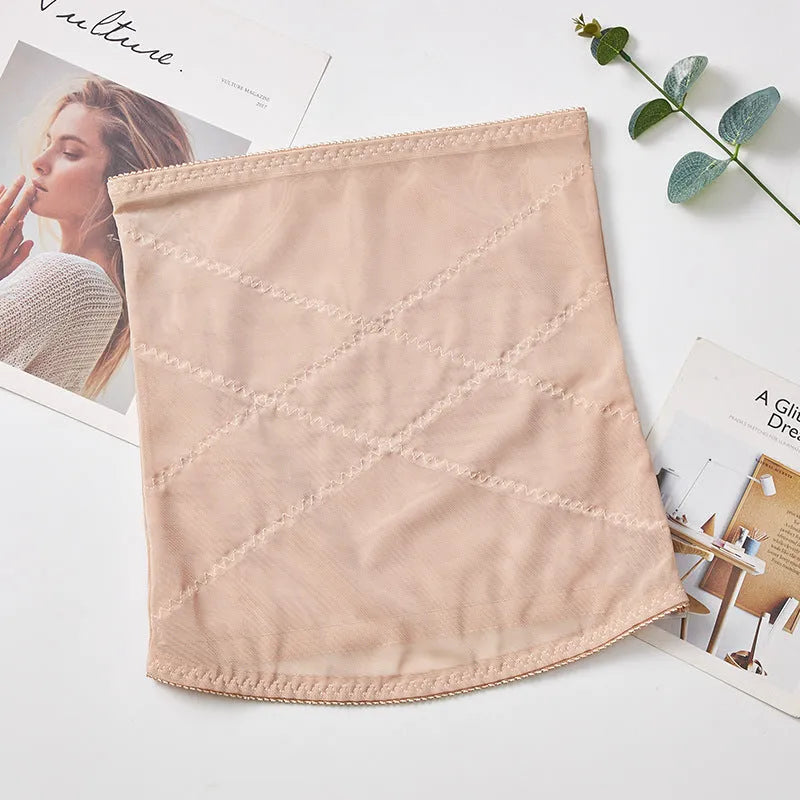 Black mesh belly band body sculpting strap for waist trimming and tummy slimming.