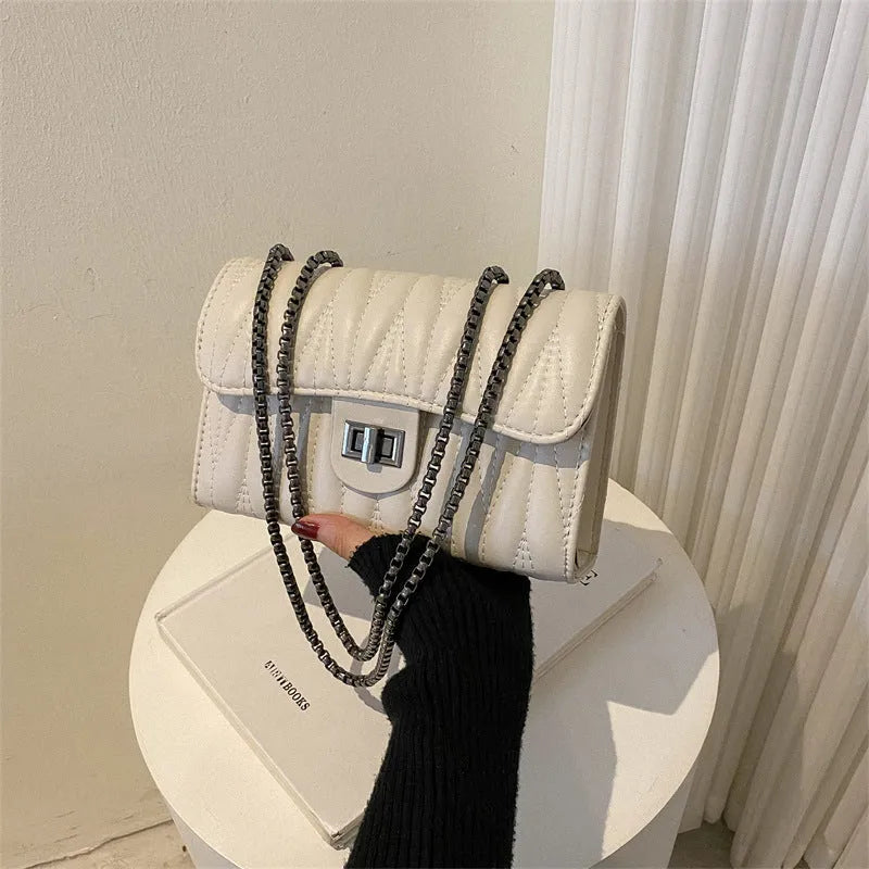 Retro textured diamond small square shoulder bag in PU leather with a soft handle, shown in one of eight colours.