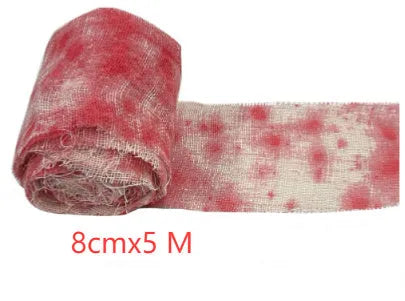 Bloody red polyester Halloween bandage roll showing 8cm width and textured surface for costume use.