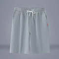 Cotton linen solid colour cropped pants with a drawstring waist in army green.