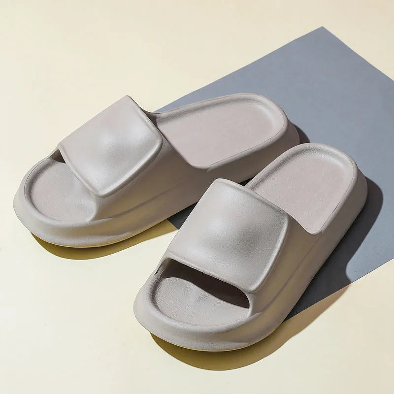 Pair of thick-soled EVA flip-flop slippers in a choice of seven colours on a white background.
