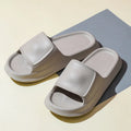 Pair of thick-soled EVA flip-flop slippers in a choice of seven colours on a white background.