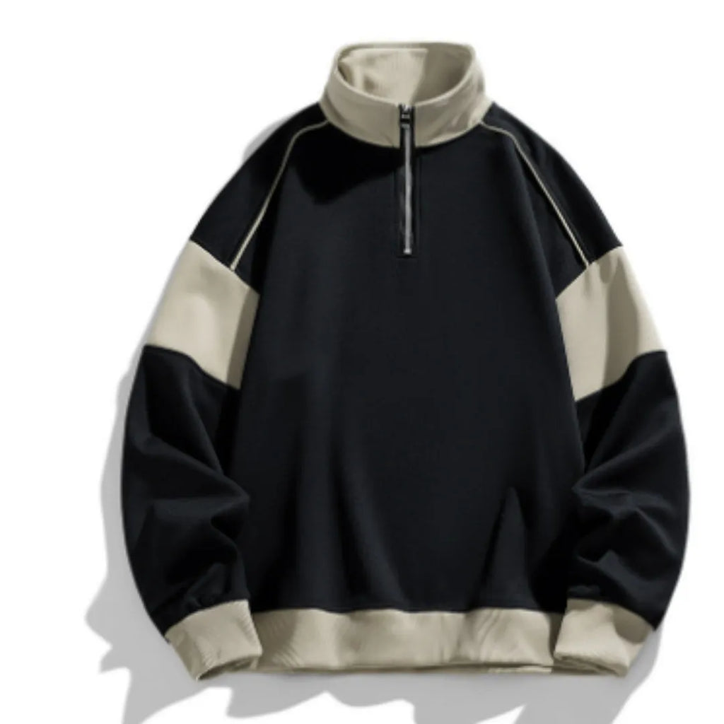 Man wearing a thin black hooded corduroy sweatshirt with drop shoulder and loose lapels.