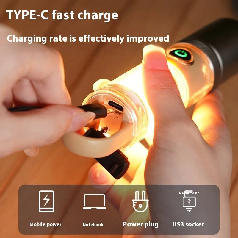 Orange 10W LED flashlight with optical zoom lens and keychain hook shown with USB charging cable