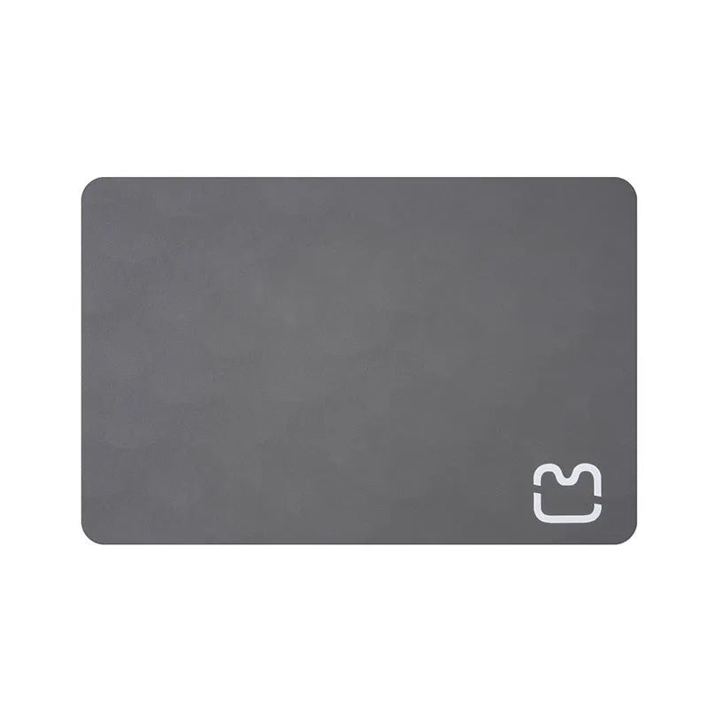 Minimalist pet feeding mat in dark gray with cat head pattern, non-slip and water-absorbing, 35x50cm