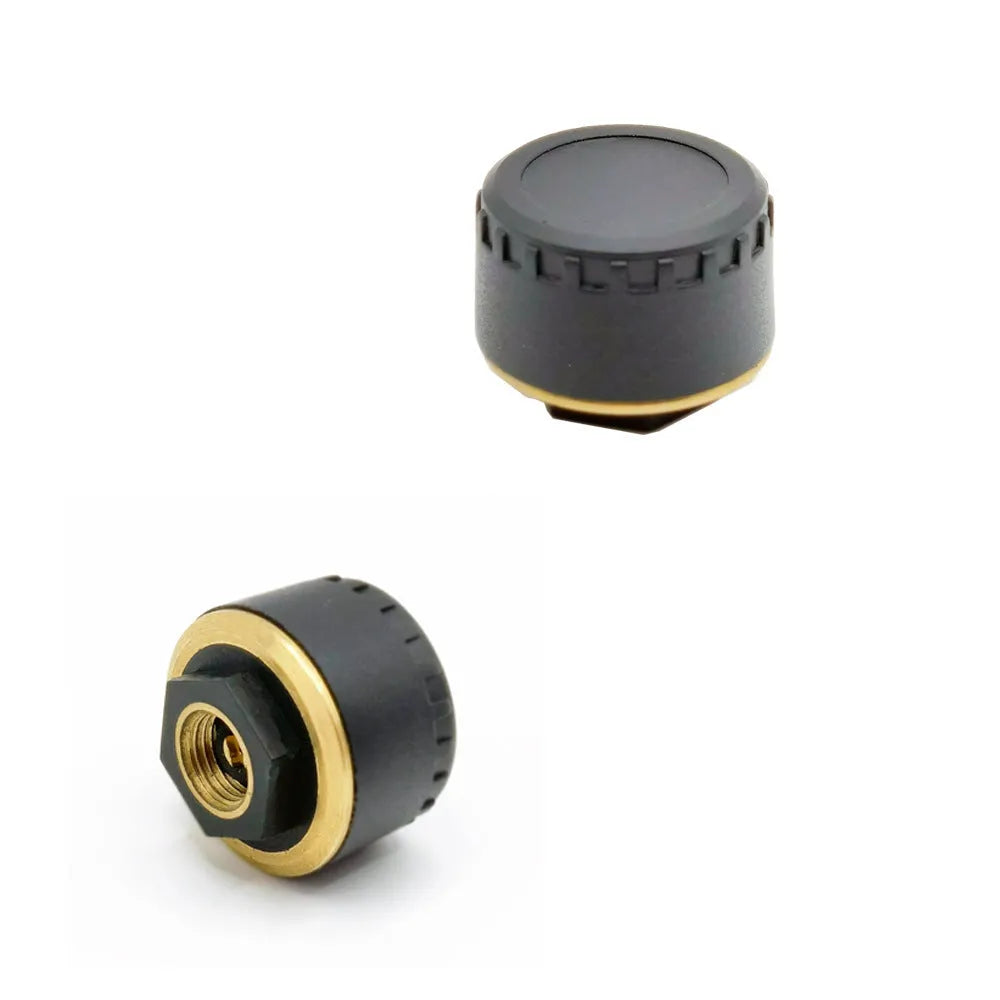Four black Bluetooth tyre pressure sensor caps for car with mobile phone display