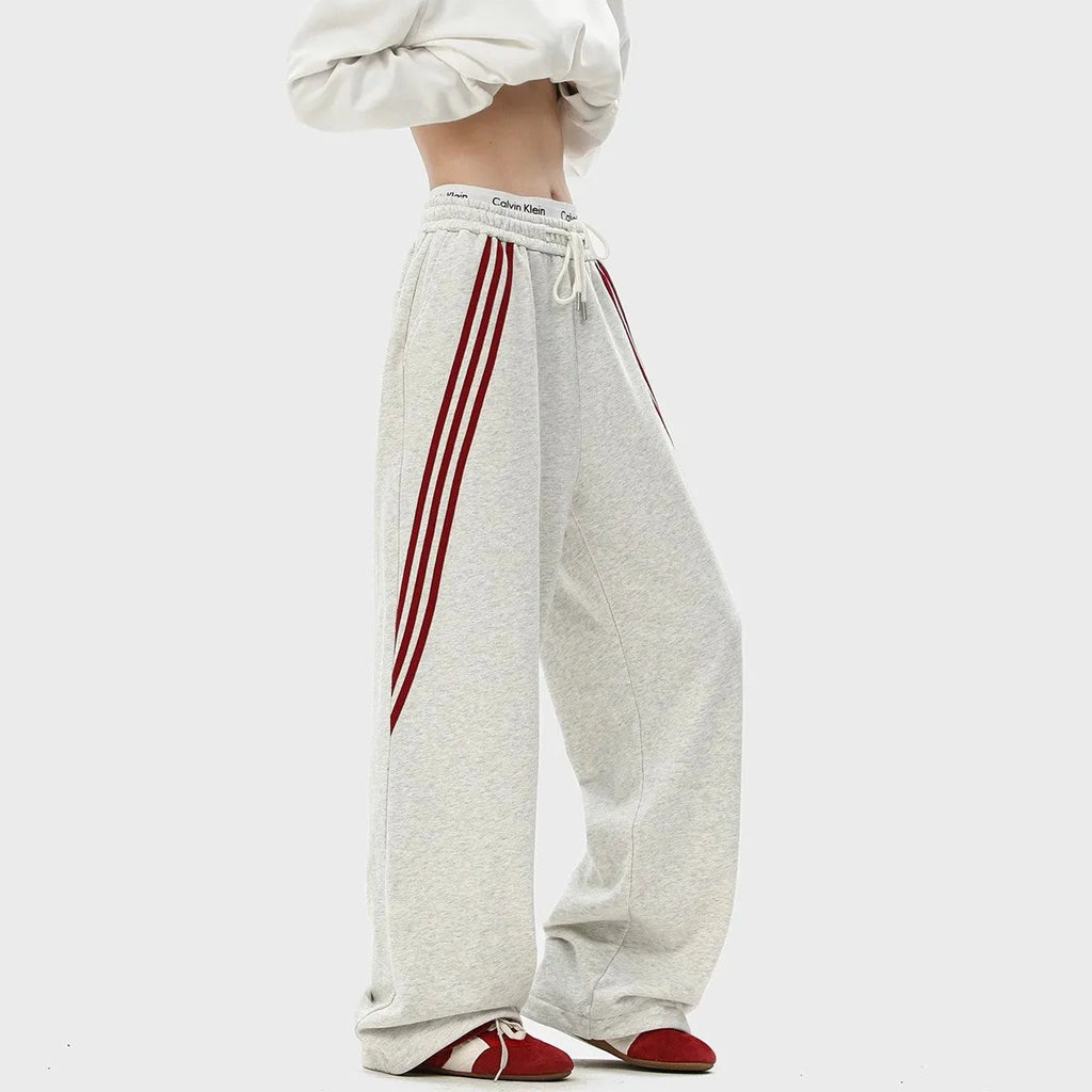 Men's striped loose straight-leg casual pants in Black, front view, showing wrinkle-free fabric and straight leg cut