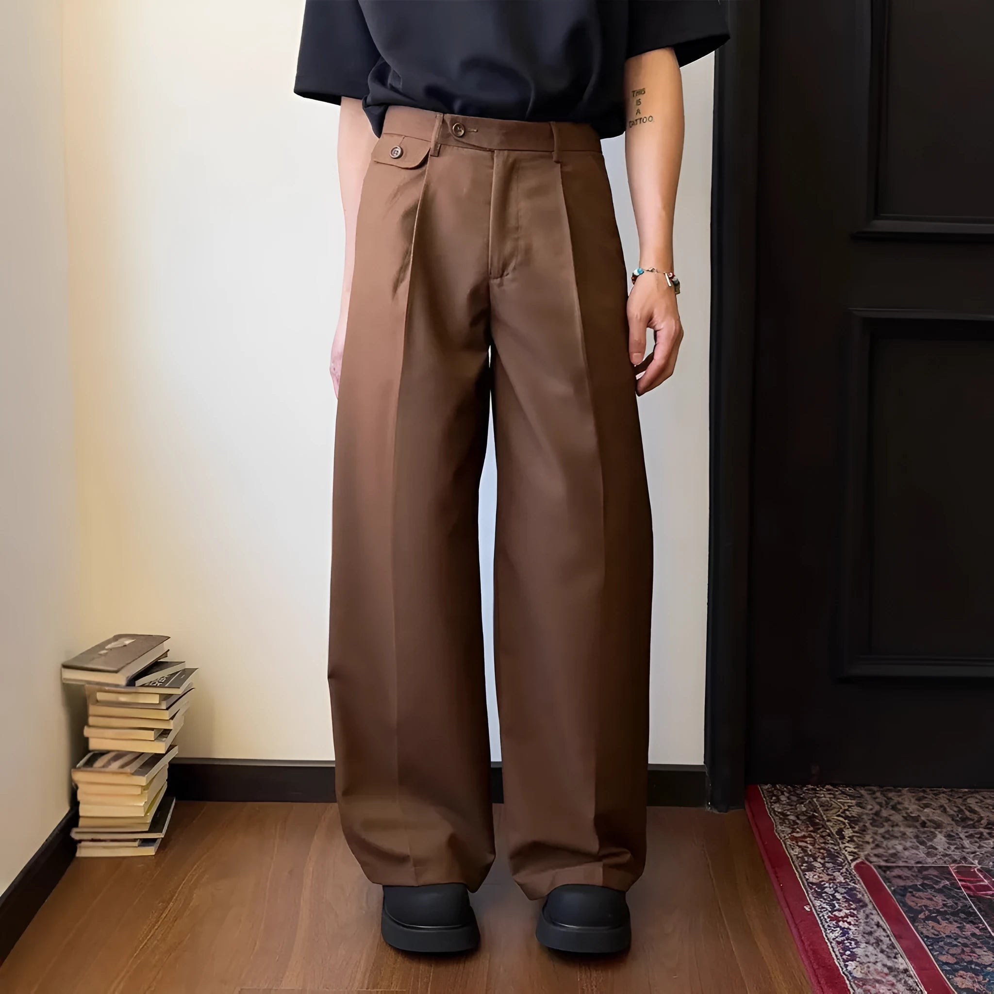 Men's brown straight-leg casual trousers with loose wide-leg design on hanger