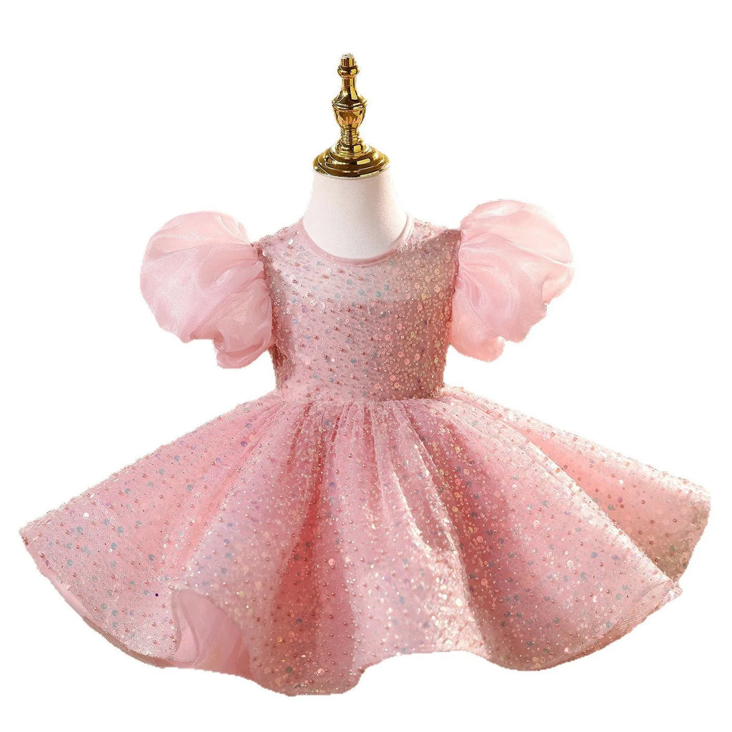 Children's sequined formal dress in pink with puff sleeves and princess-style silhouette for weddings and parties