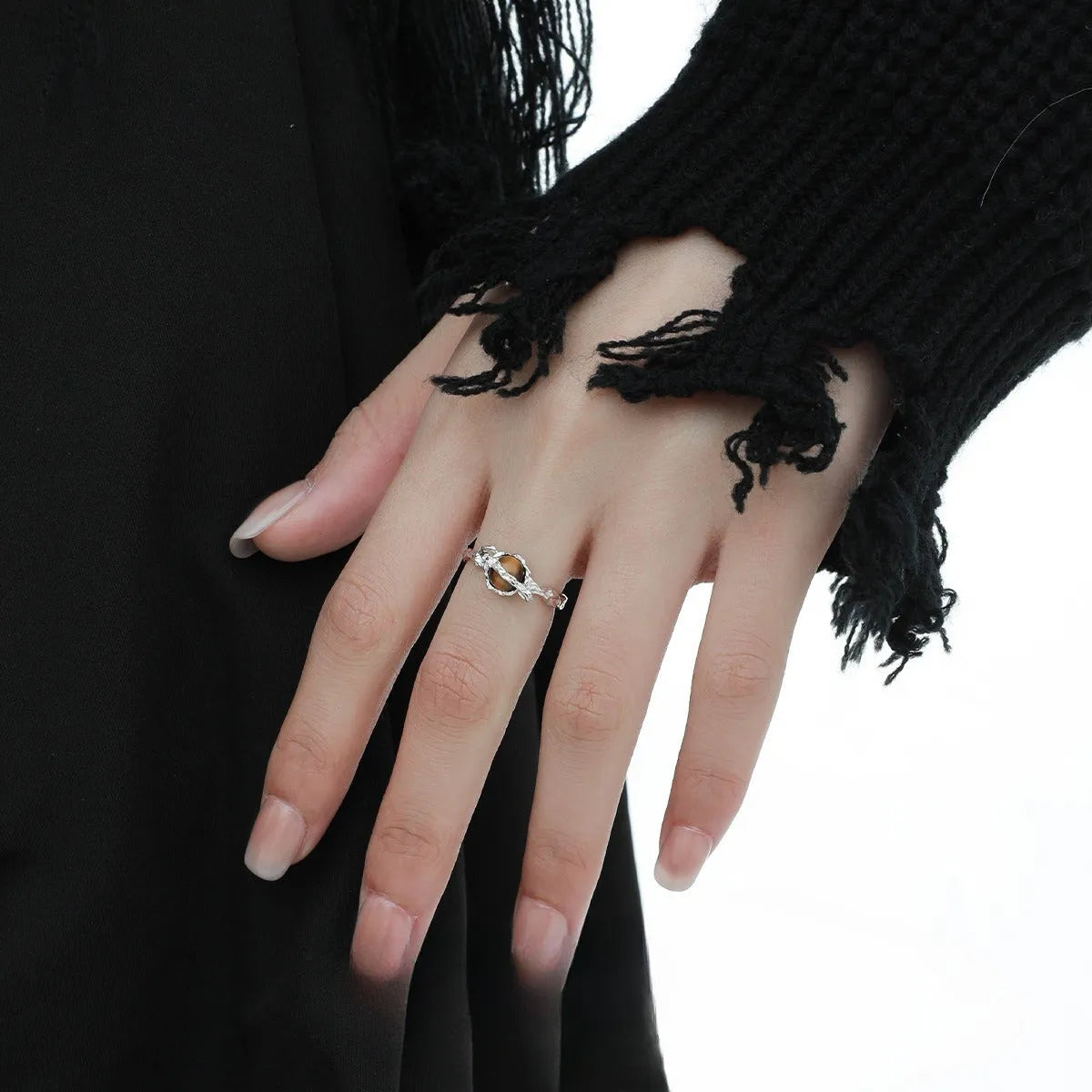 Women's adjustable silver open ring with Saturn design and white gold colour finish.