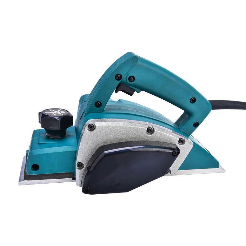 Red aluminium shell electric wood planer with 82mm cutting width on workbench