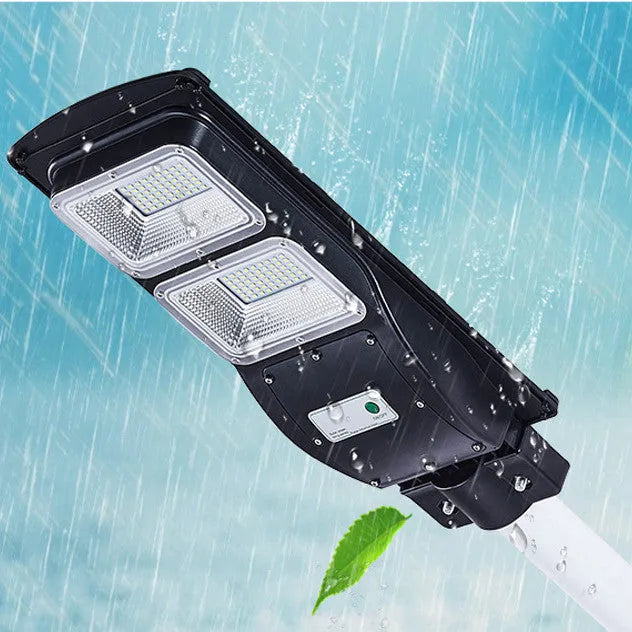 Integrated solar street light unit with solar panel and LED light source for outdoor installation