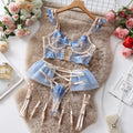 Light blue embroidered lace women's bra and panty set with transparent push up design and mesh detail.